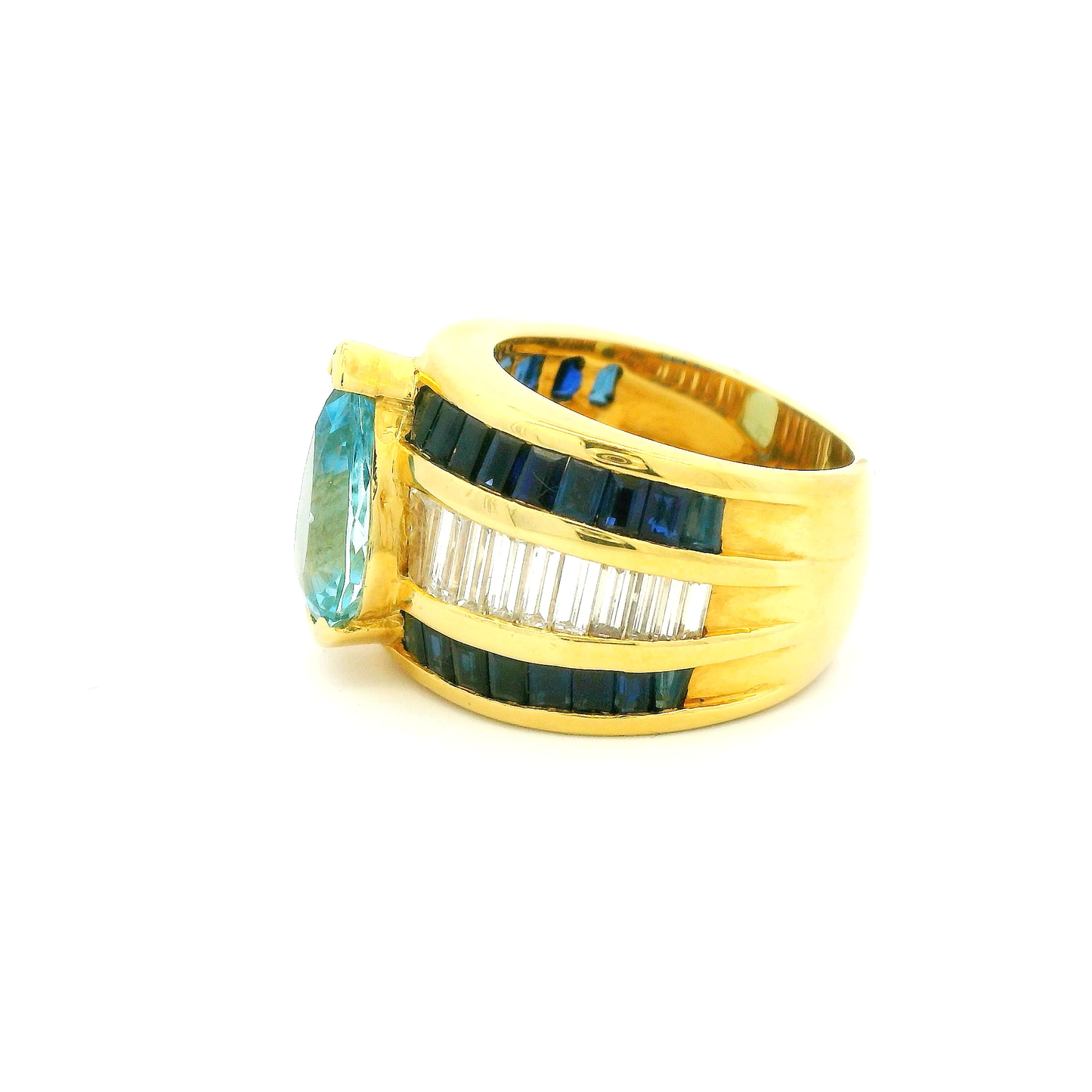 18kt-yellow-gold-cocktail-ring-with-pear-shaped-aquamarine-sapphire-and-baguettes