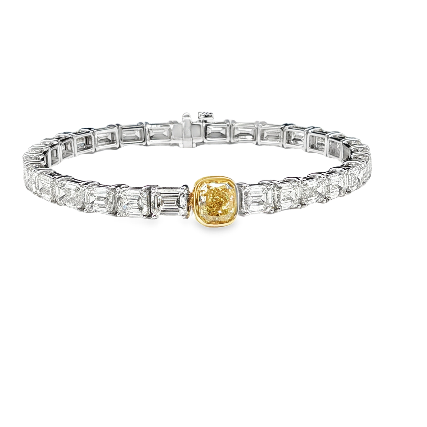 18K White Gold Tennis Bracelet with 29 Emerald Cut Diamonds and a GIA 1.50 Fancy intense Yellow Diamond