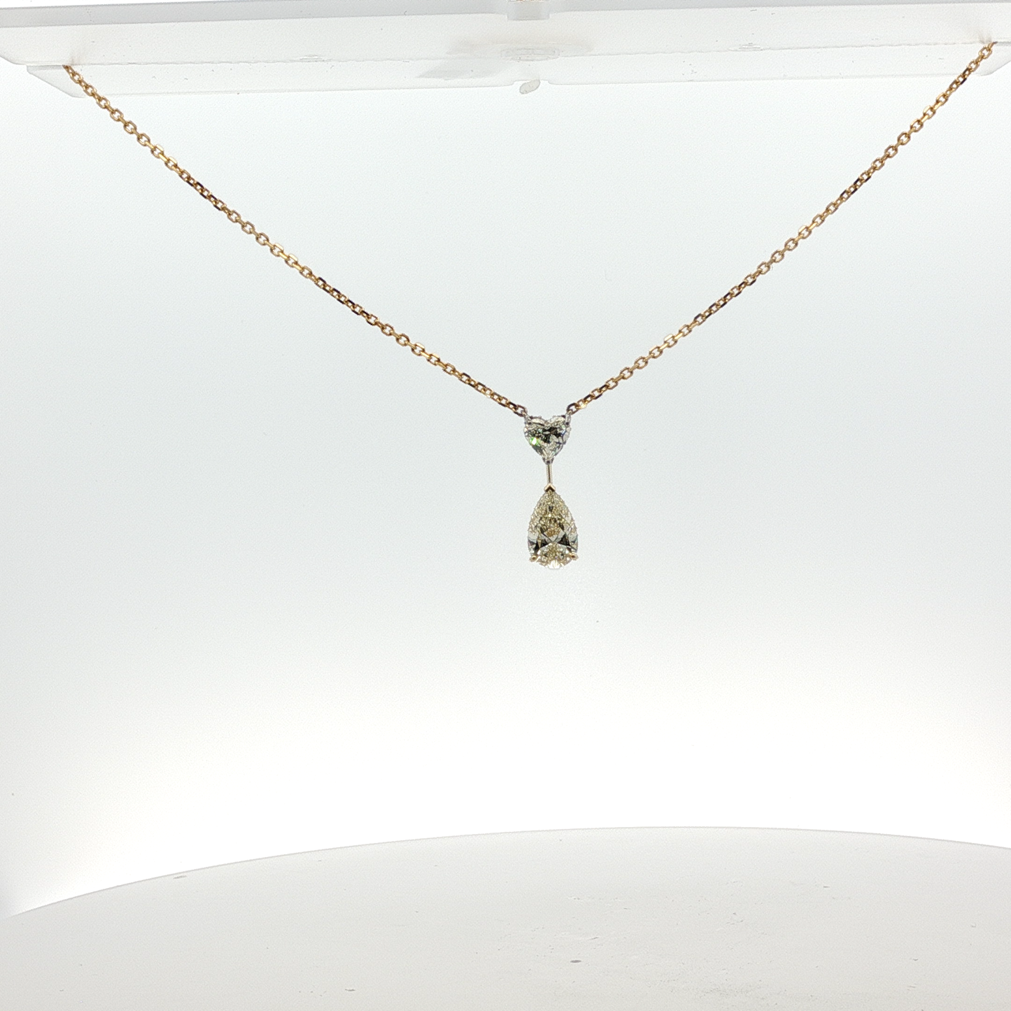 Yellow Gold Necklace with Heart shape and Pear Cut Diamond Pendant
