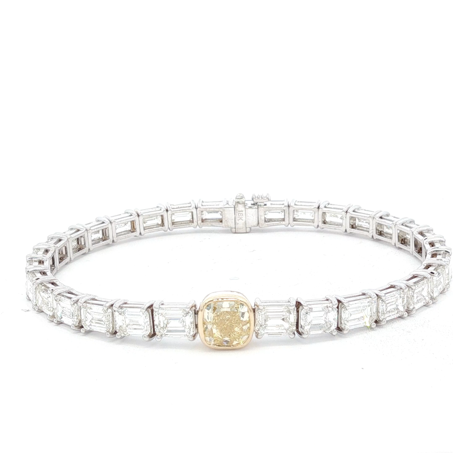 14-white-gold-tennis-bracelet-with-1-71-fancy-intense-yellow-cushion-cut-diamond