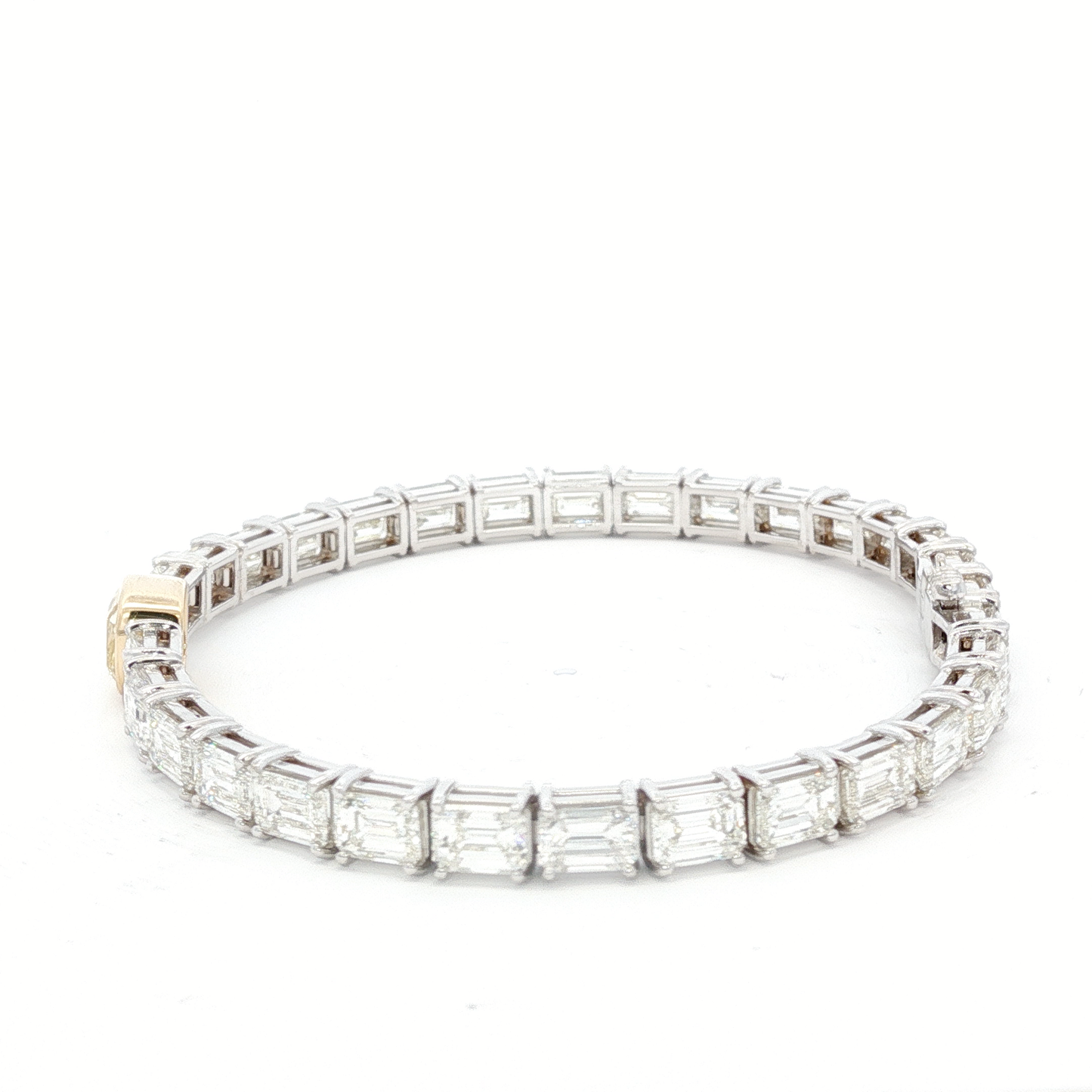 14-white-gold-tennis-bracelet-with-1-71-fancy-intense-yellow-cushion-cut-diamond