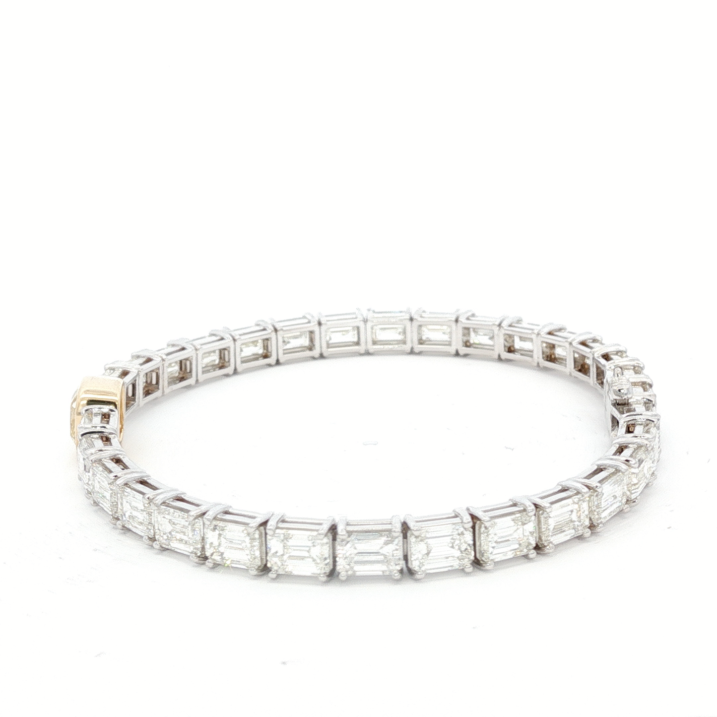 14-white-gold-tennis-bracelet-with-1-71-fancy-intense-yellow-cushion-cut-diamond