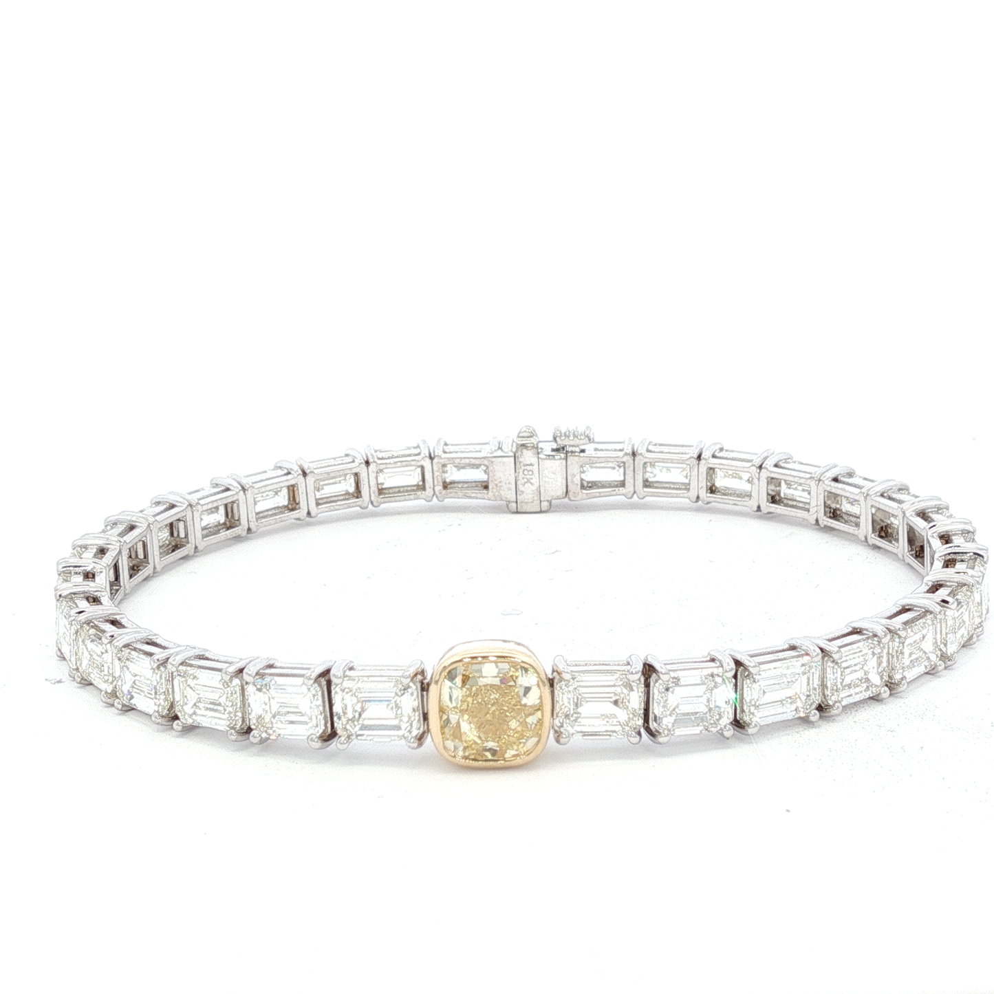14-white-gold-tennis-bracelet-with-1-71-fancy-intense-yellow-cushion-cut-diamond