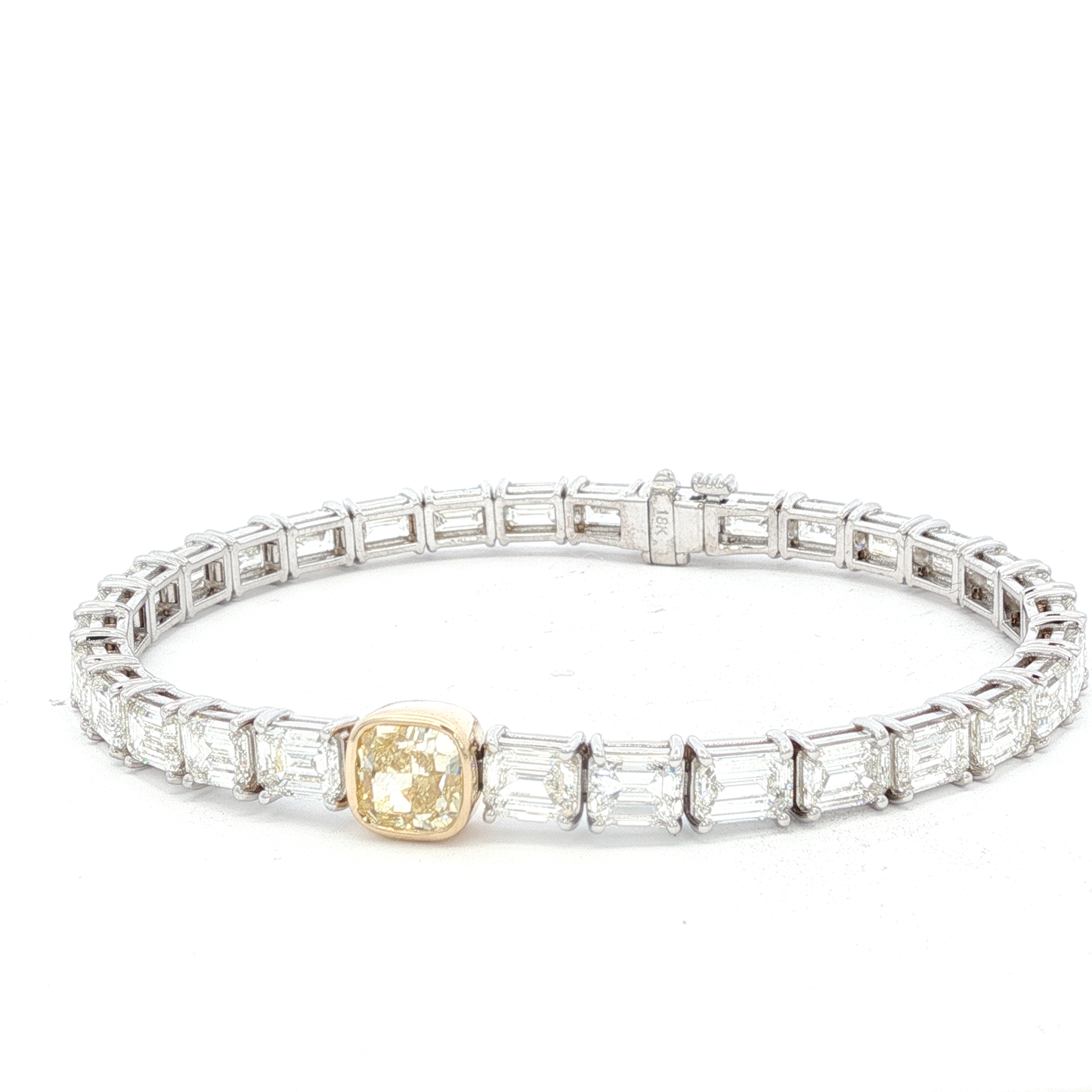 14-white-gold-tennis-bracelet-with-1-71-fancy-intense-yellow-cushion-cut-diamond