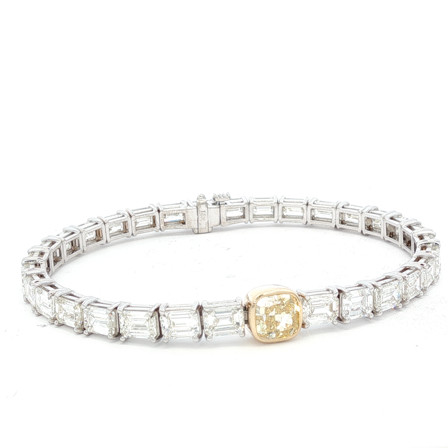 14-white-gold-tennis-bracelet-with-1-71-fancy-intense-yellow-cushion-cut-diamond