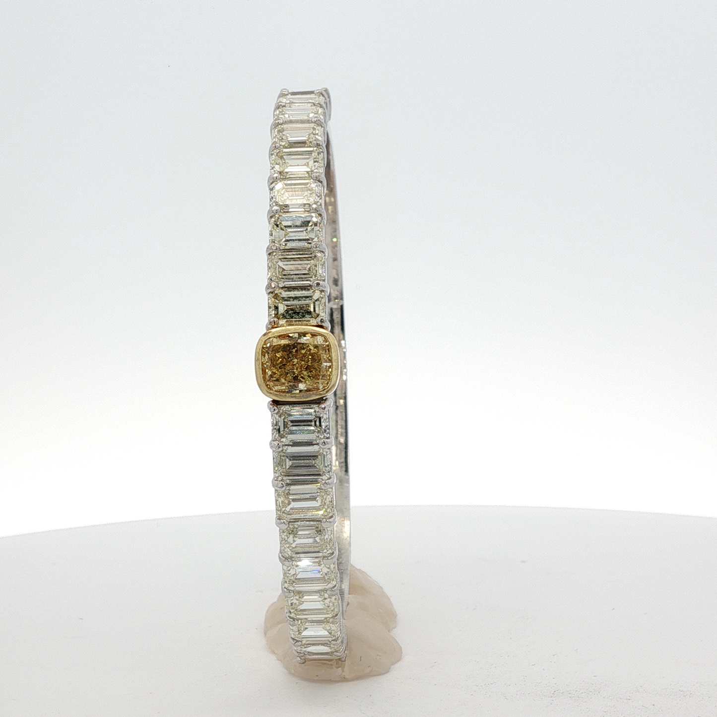 14-white-gold-tennis-bracelet-with-1-71-fancy-intense-yellow-cushion-cut-diamond