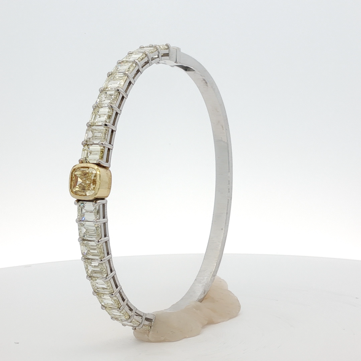 14-white-gold-tennis-bracelet-with-1-71-fancy-intense-yellow-cushion-cut-diamond