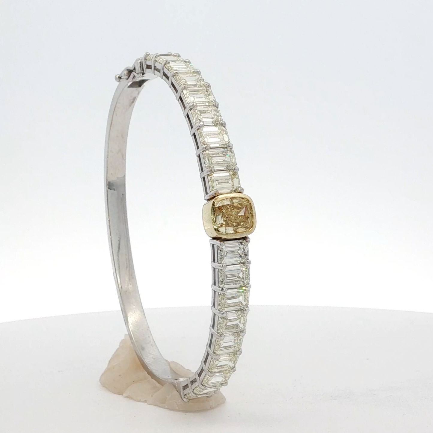14-white-gold-tennis-bracelet-with-1-71-fancy-intense-yellow-cushion-cut-diamond
