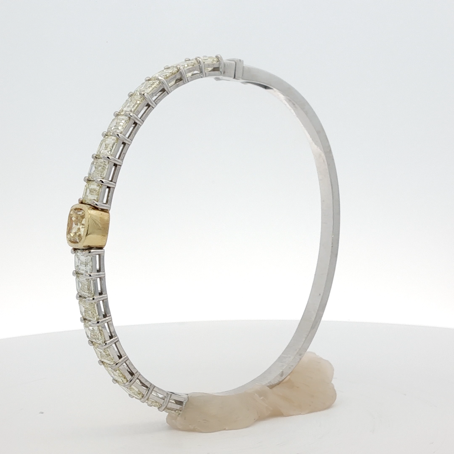14-white-gold-tennis-bracelet-with-1-71-fancy-intense-yellow-cushion-cut-diamond