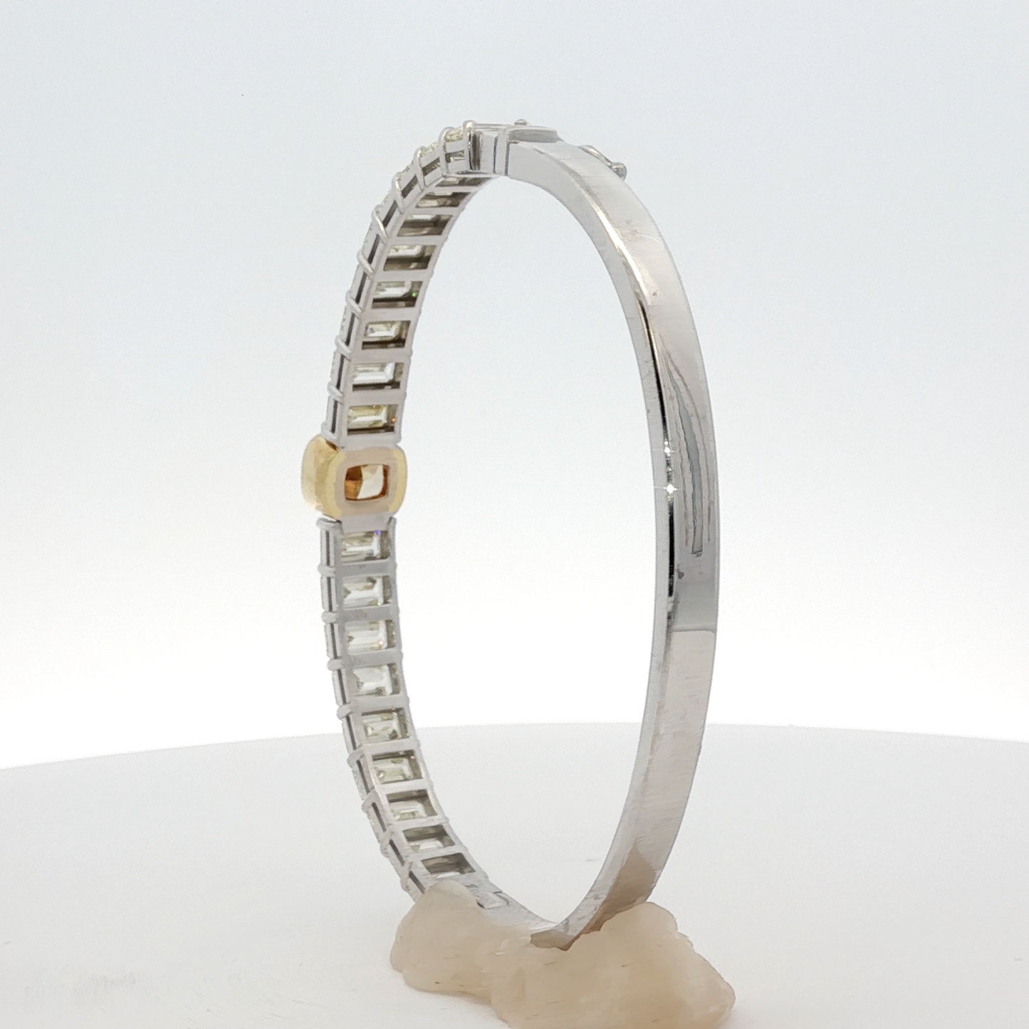 14-white-gold-tennis-bracelet-with-1-71-fancy-intense-yellow-cushion-cut-diamond