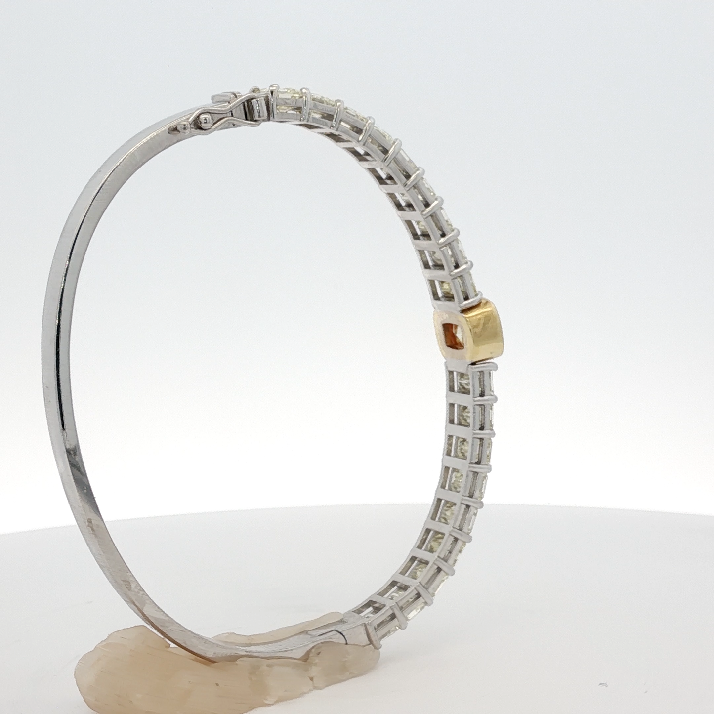 14-white-gold-tennis-bracelet-with-1-71-fancy-intense-yellow-cushion-cut-diamond