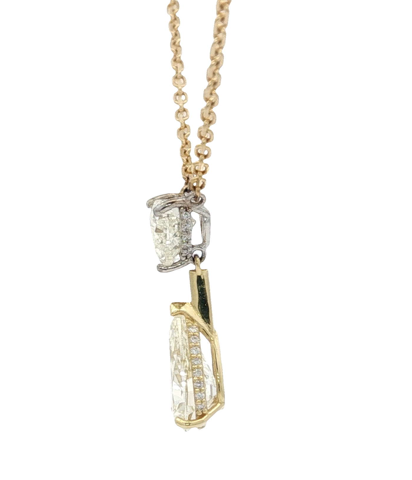 yellow-gold-necklace-with-heart-shape-and-pear-cut-diamond-pendant