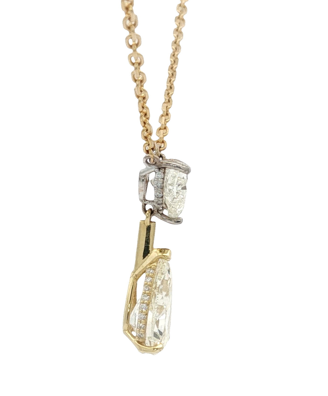 yellow-gold-necklace-with-heart-shape-and-pear-cut-diamond-pendant