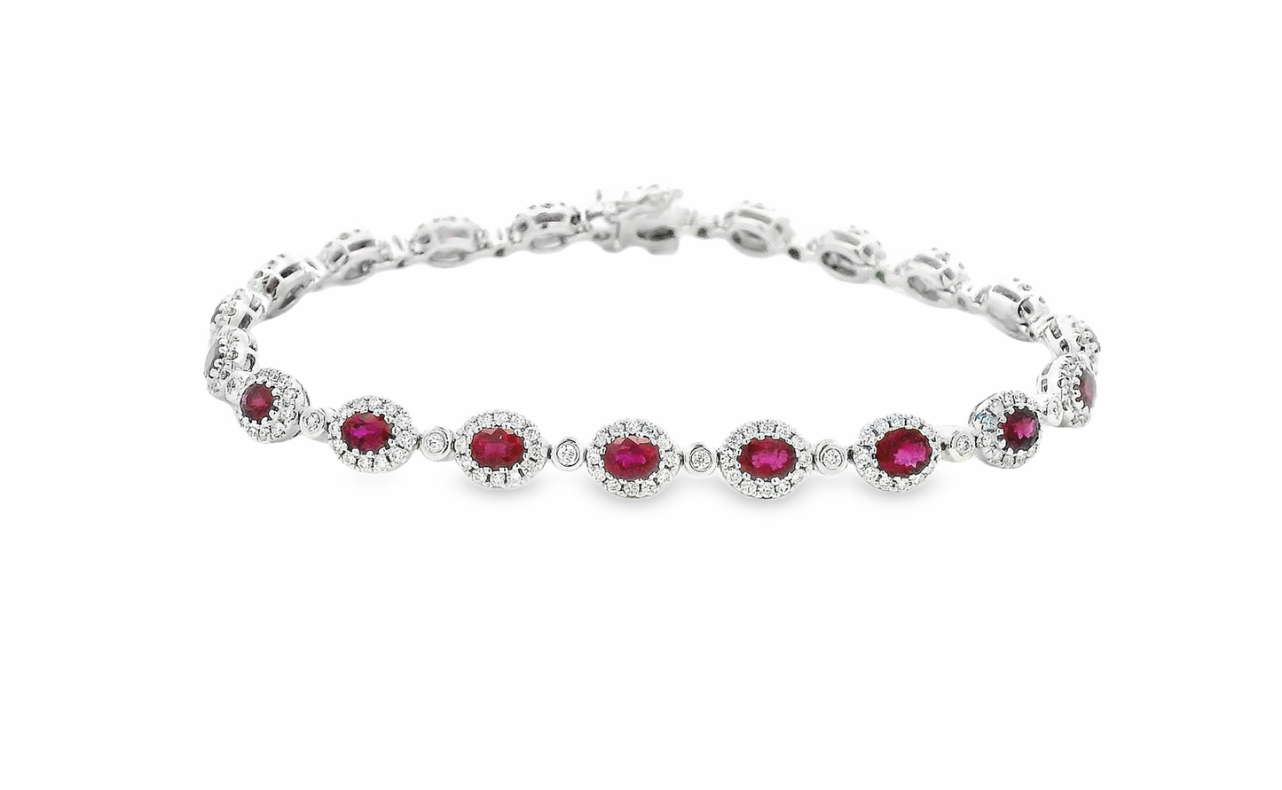 18kt White Gold Tennis Bracelet with Oval Cut Rubies