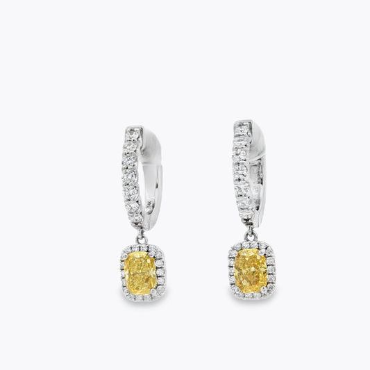 White Gold Dangle Earrings with Cushion Cut Vivid Yellow Diamonds. Uncanny matching pair !!