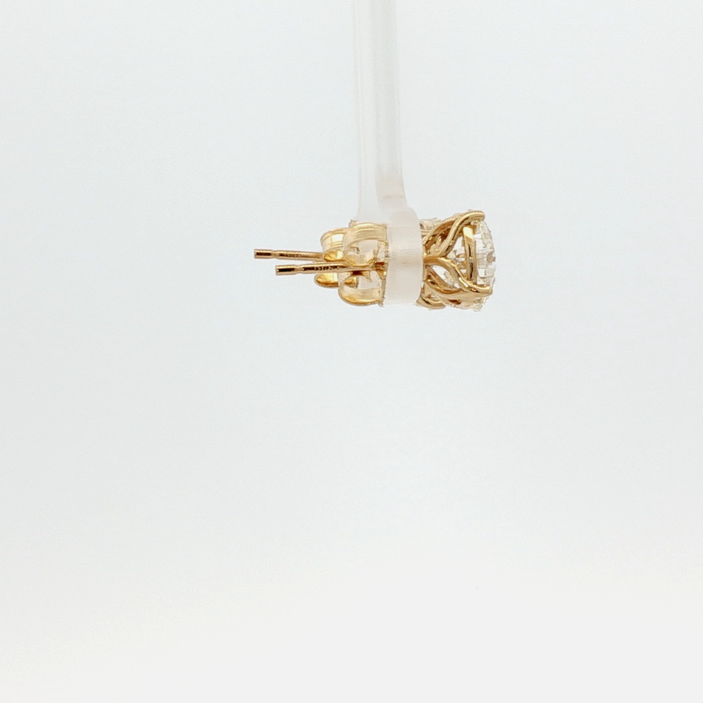 a-matching-pair-of-l-if-2-24-and-2-17-brilliant-cut-diamond-stud-earrings-in-yellow-gold