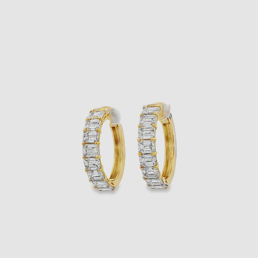 14K Yellow gold hoops with 6.87 CT Emerald Cut Diamonds