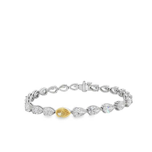 18K White Gold Tennis Bracelet with Pear Cut Fancy Vivid Yellow Diamond