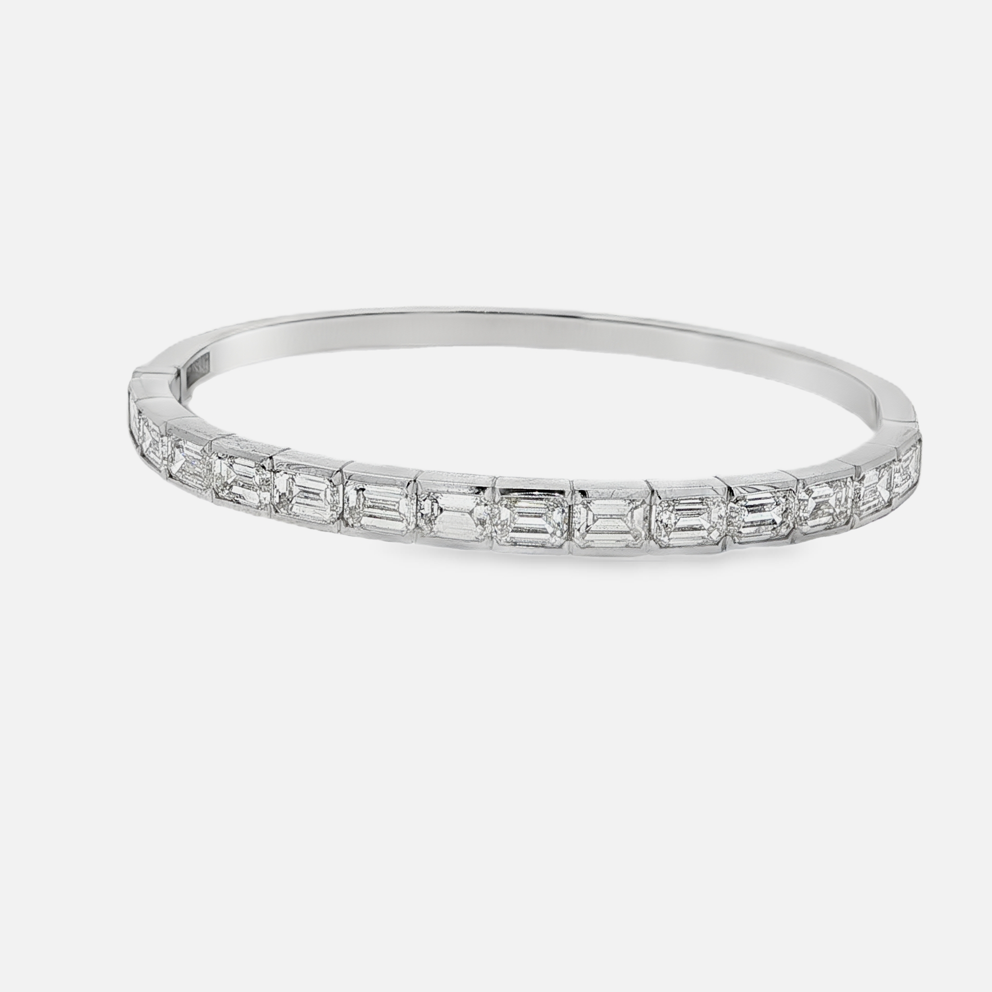 Elegant 14k White Gold Bangle with 7.760ct Emerald Cut Diamonds