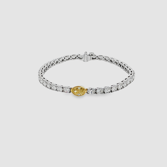White Gold Tennis Bracelet with Round Brilliant Diamonds and a Fancy yellow Oval