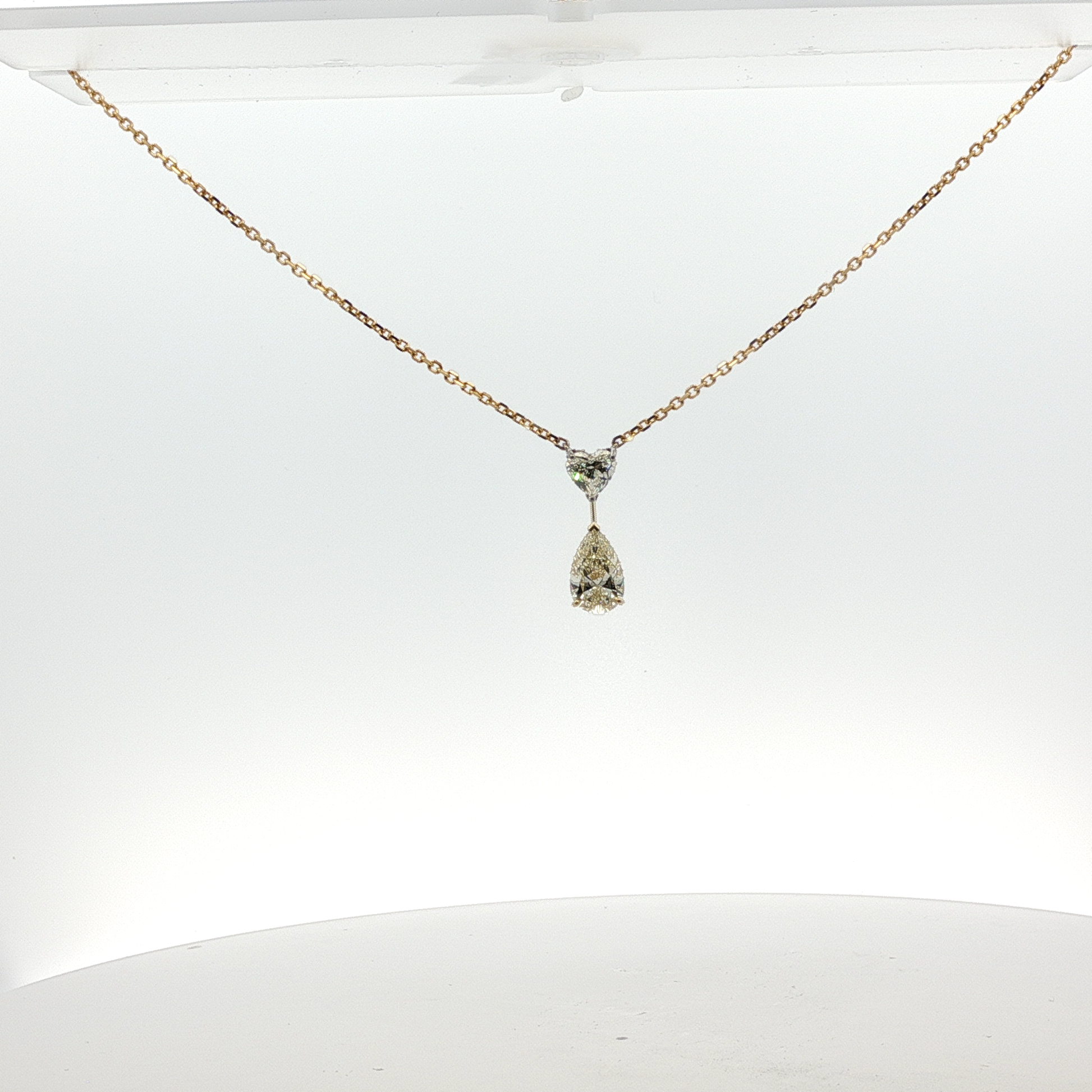 Yellow Gold Necklace with Heart shape and  Pear Cut Diamond Pendant
