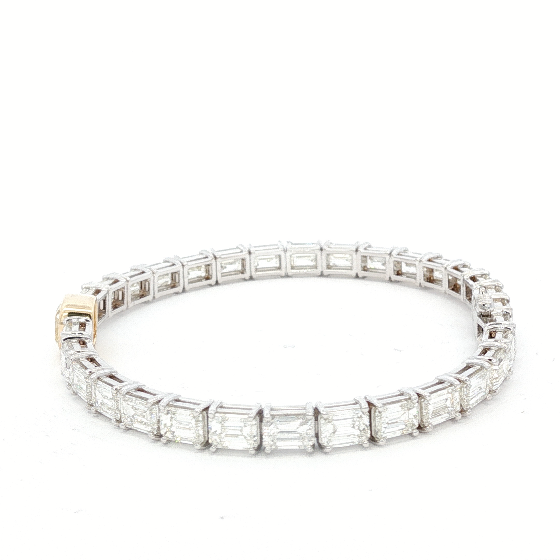 14-white-gold-tennis-bracelet-with-1-71-fancy-intense-yellow-cushion-cut-diamond
