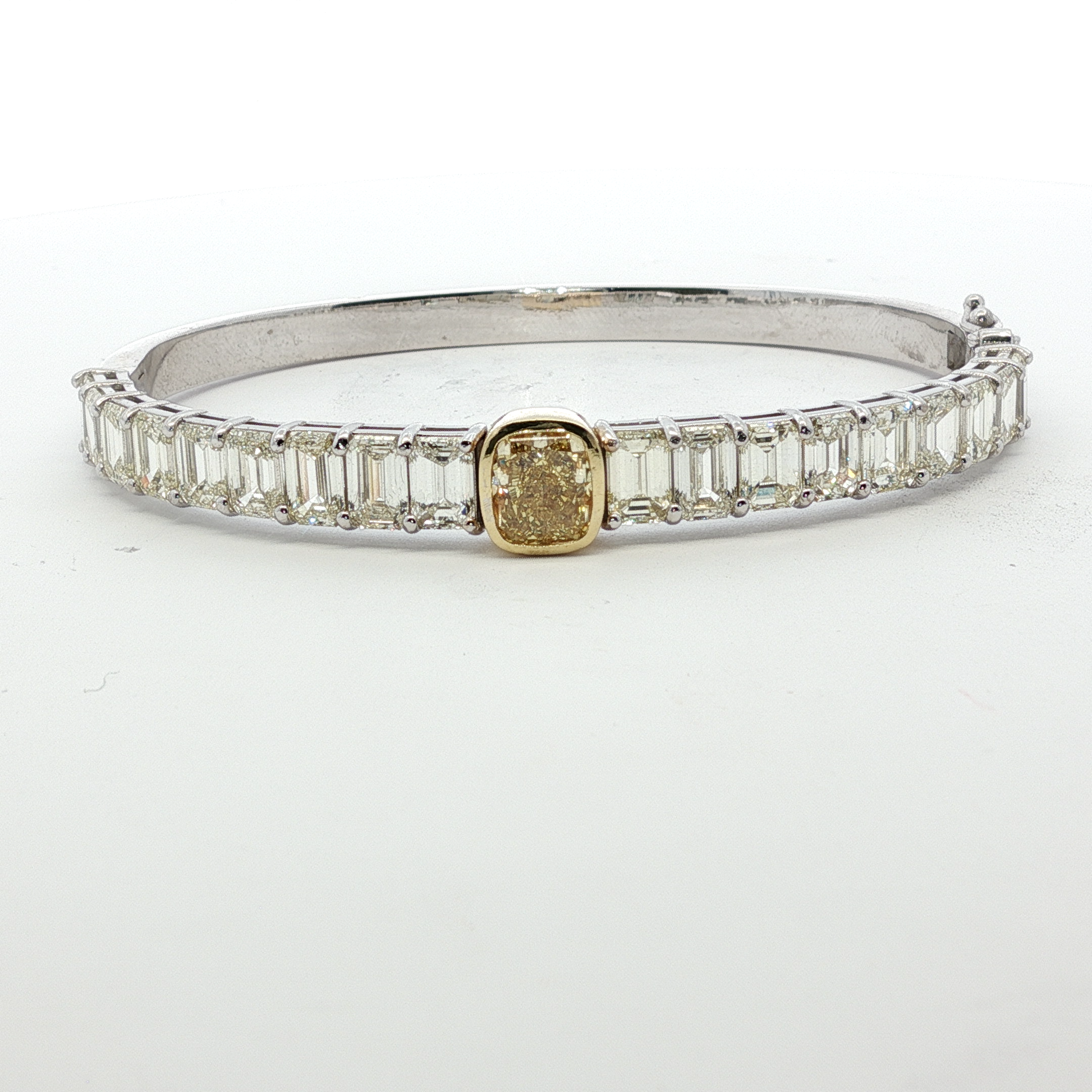 14-white-gold-tennis-bracelet-with-1-71-fancy-intense-yellow-cushion-cut-diamond
