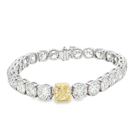 18K White Gold Tennis Bracelet with 26.25 ct Round Brilliant-Cut Diamonds and 1.71 GIA Fancy Yellow Diamond