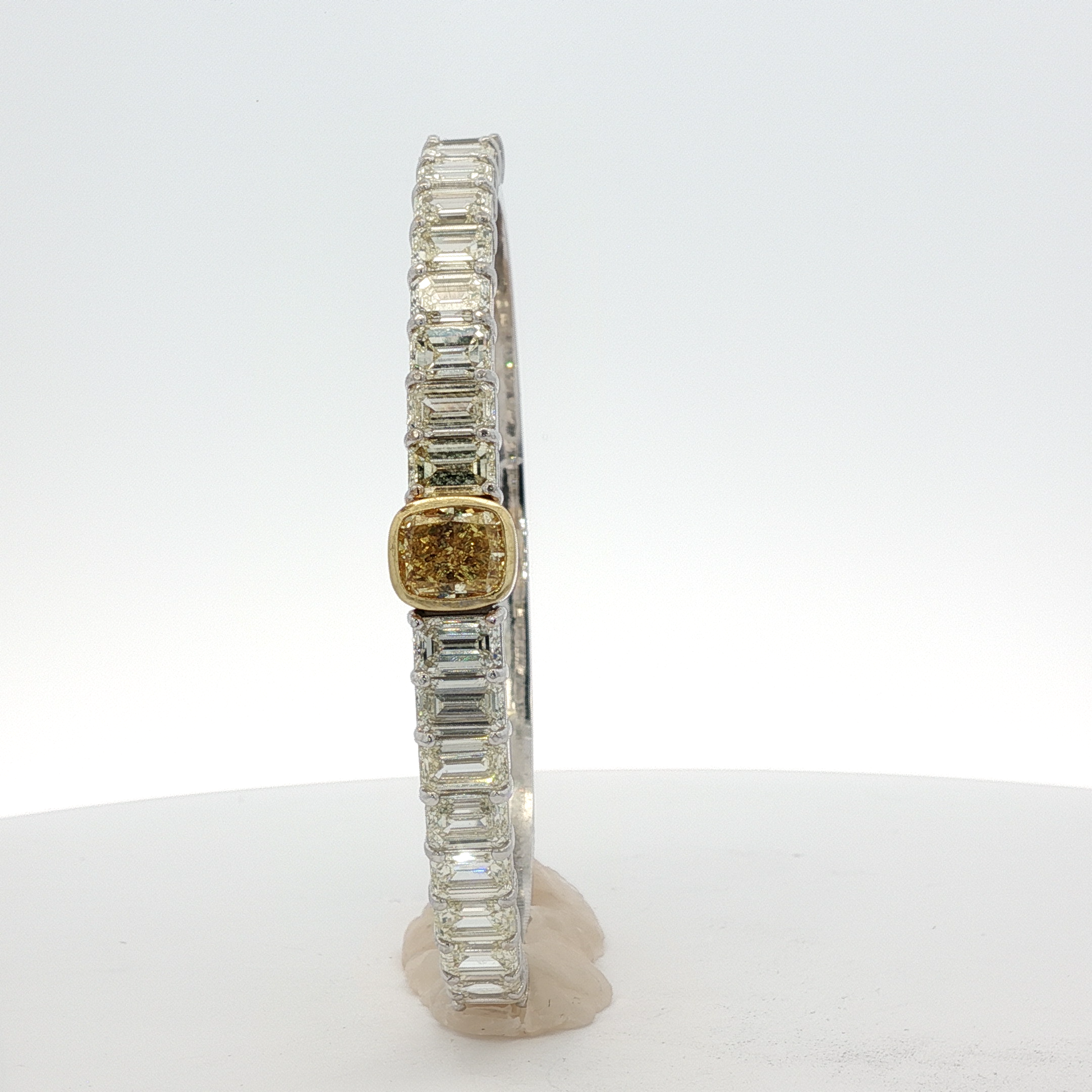 14-white-gold-tennis-bracelet-with-1-71-fancy-intense-yellow-cushion-cut-diamond