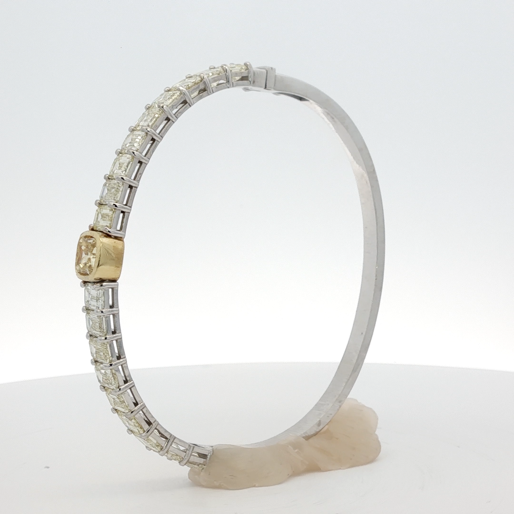 14-white-gold-tennis-bracelet-with-1-71-fancy-intense-yellow-cushion-cut-diamond