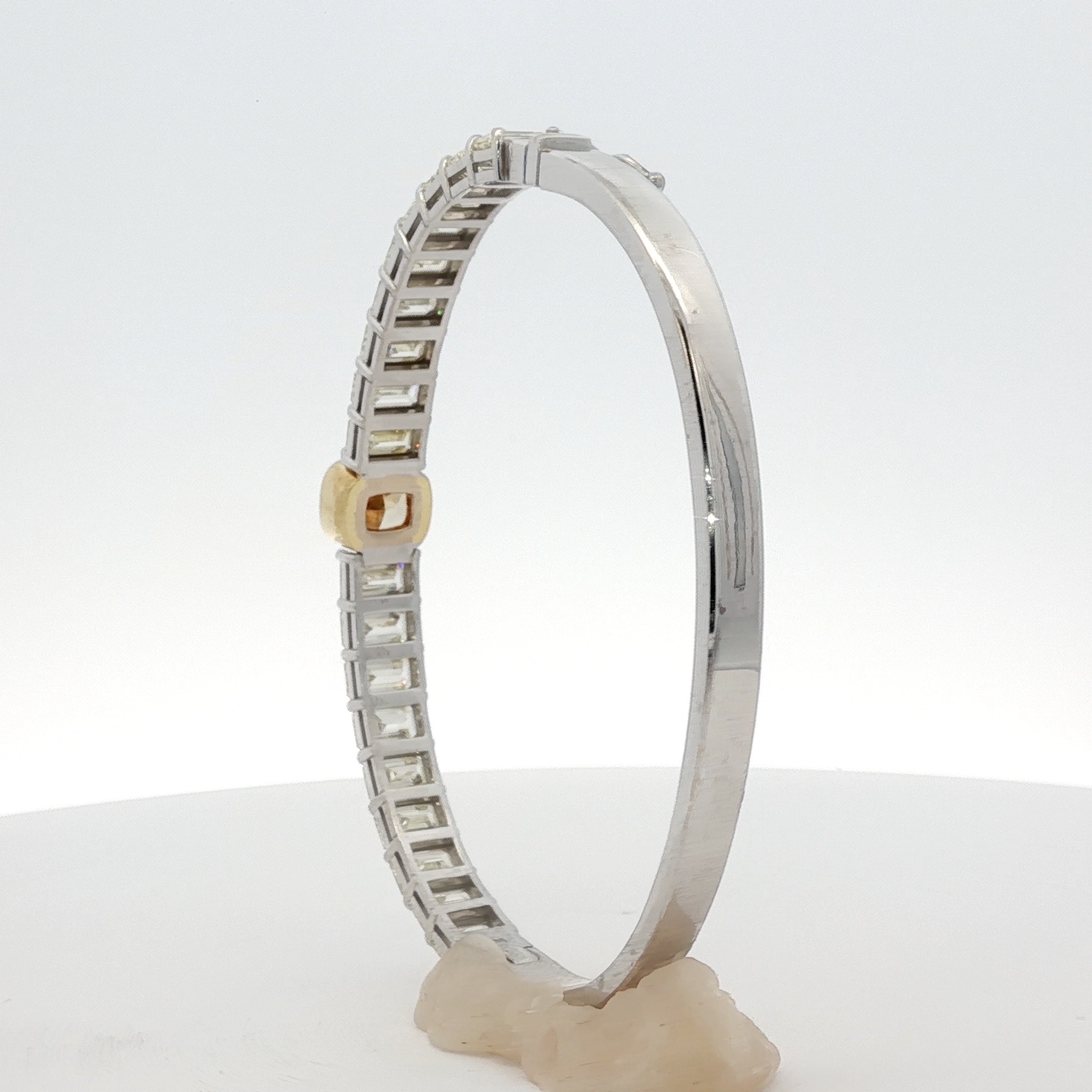 14-white-gold-tennis-bracelet-with-1-71-fancy-intense-yellow-cushion-cut-diamond