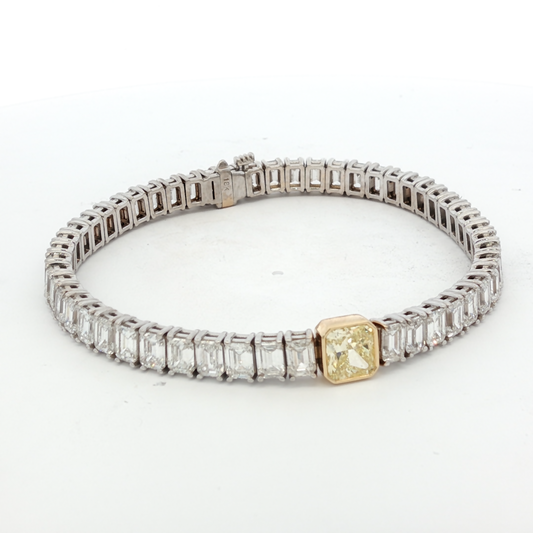 18K White Gold Tennis Bracelet with 51 EC stones (13.42 ct)  and 1.00ct Fancy Intense Yellow Radiant Cut Diamond