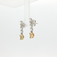 one-of-a-kind-matching-set-of-fancy-intense-yellow-cushion-cut-diamond-dangle-earrings-in-white-gold