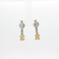 one-of-a-kind-matching-set-of-fancy-intense-yellow-cushion-cut-diamond-dangle-earrings-in-white-gold
