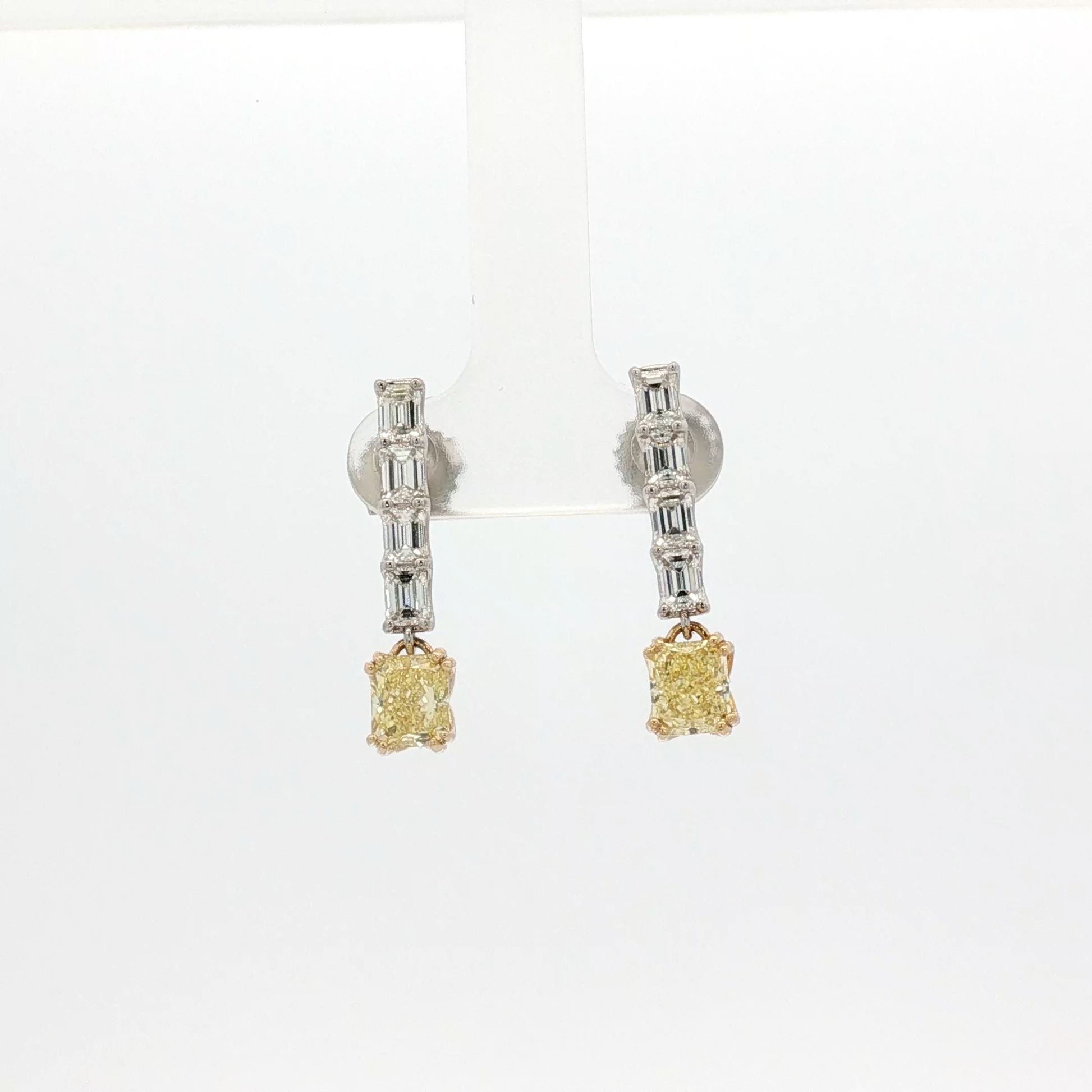one-of-a-kind-matching-set-of-fancy-intense-yellow-cushion-cut-diamond-dangle-earrings-in-white-gold