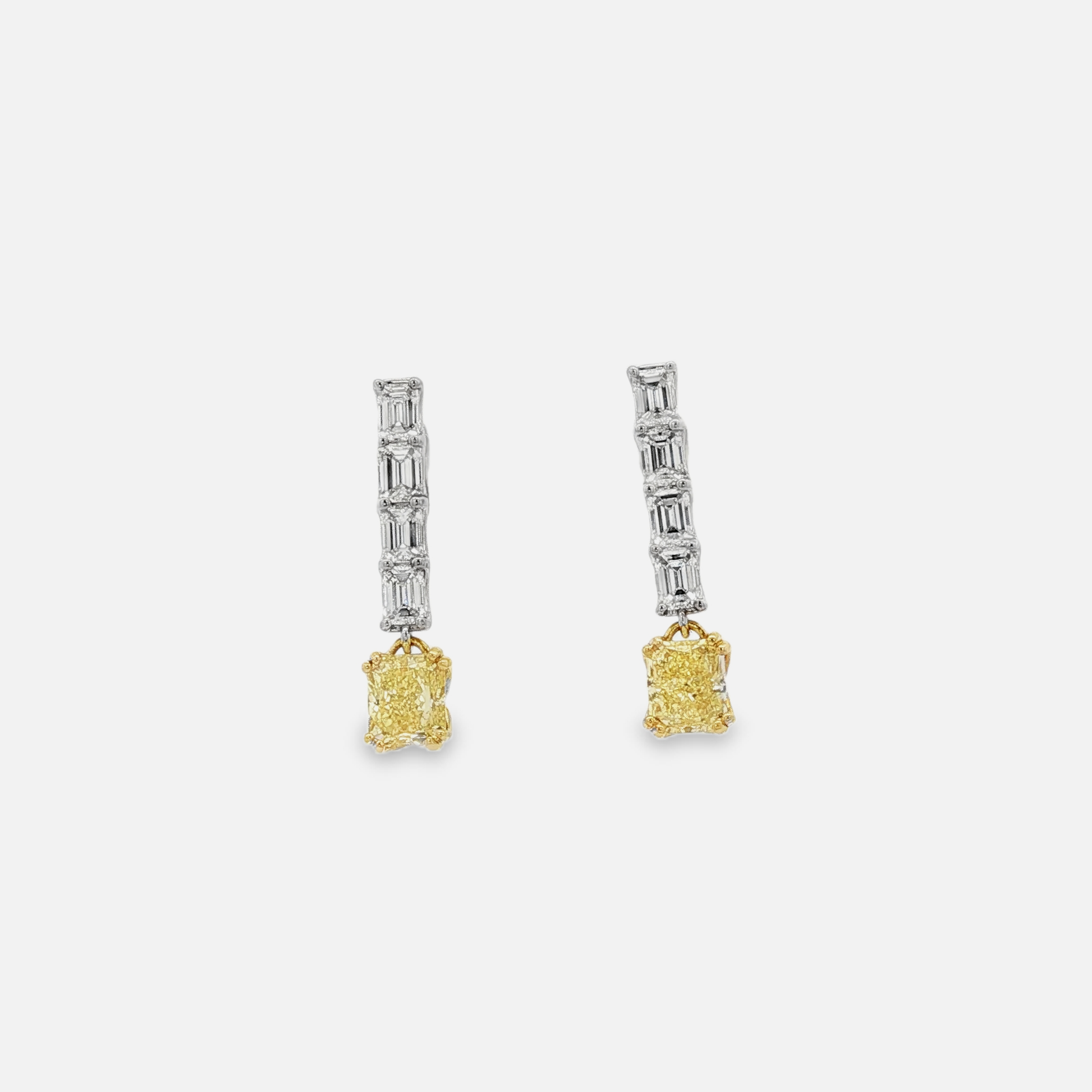 one of a kind matching set of Fancy Intense  Yellow Cushion Cut Diamond Dangle Earrings in White Gold
