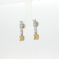 one-of-a-kind-matching-set-of-fancy-intense-yellow-cushion-cut-diamond-dangle-earrings-in-white-gold