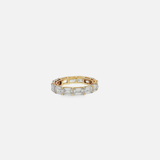 Gold Eternity Ring with 4.69 CT Emerald Cut Diamonds
