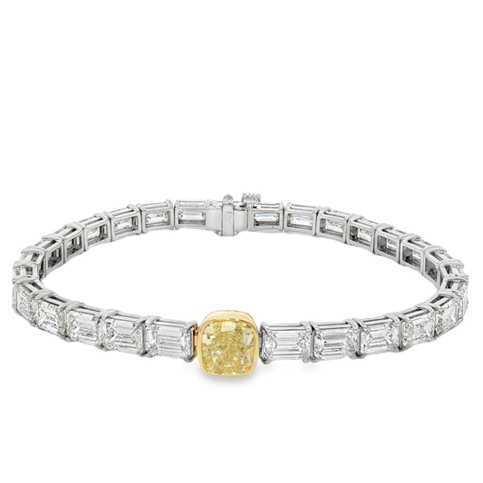 One of a kind 18K White Gold Tennis Bracelet with Fancy intense Yellow and 15.15 CT of Emerald-Cut Diamond