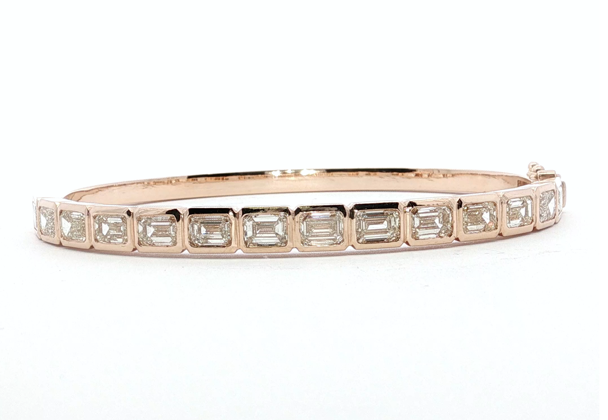 14kt Rose Gold Bangle with 7CT Emerald Cut Diamonds