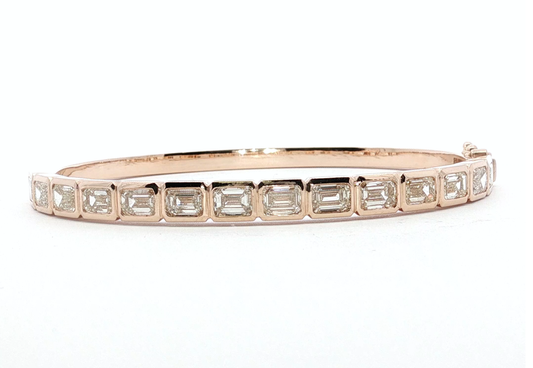 14kt Rose Gold Bangle with 7CT Emerald Cut Diamonds
