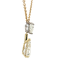 yellow-gold-necklace-with-heart-shape-and-pear-cut-diamond-pendant