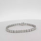 18K White Gold Tennis Bracelet with 11.73CT Emerald Cut Diamonds