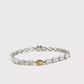 18K White Gold Tennis Bracelet with Pear Cut Fancy Vivid Yellow Diamond