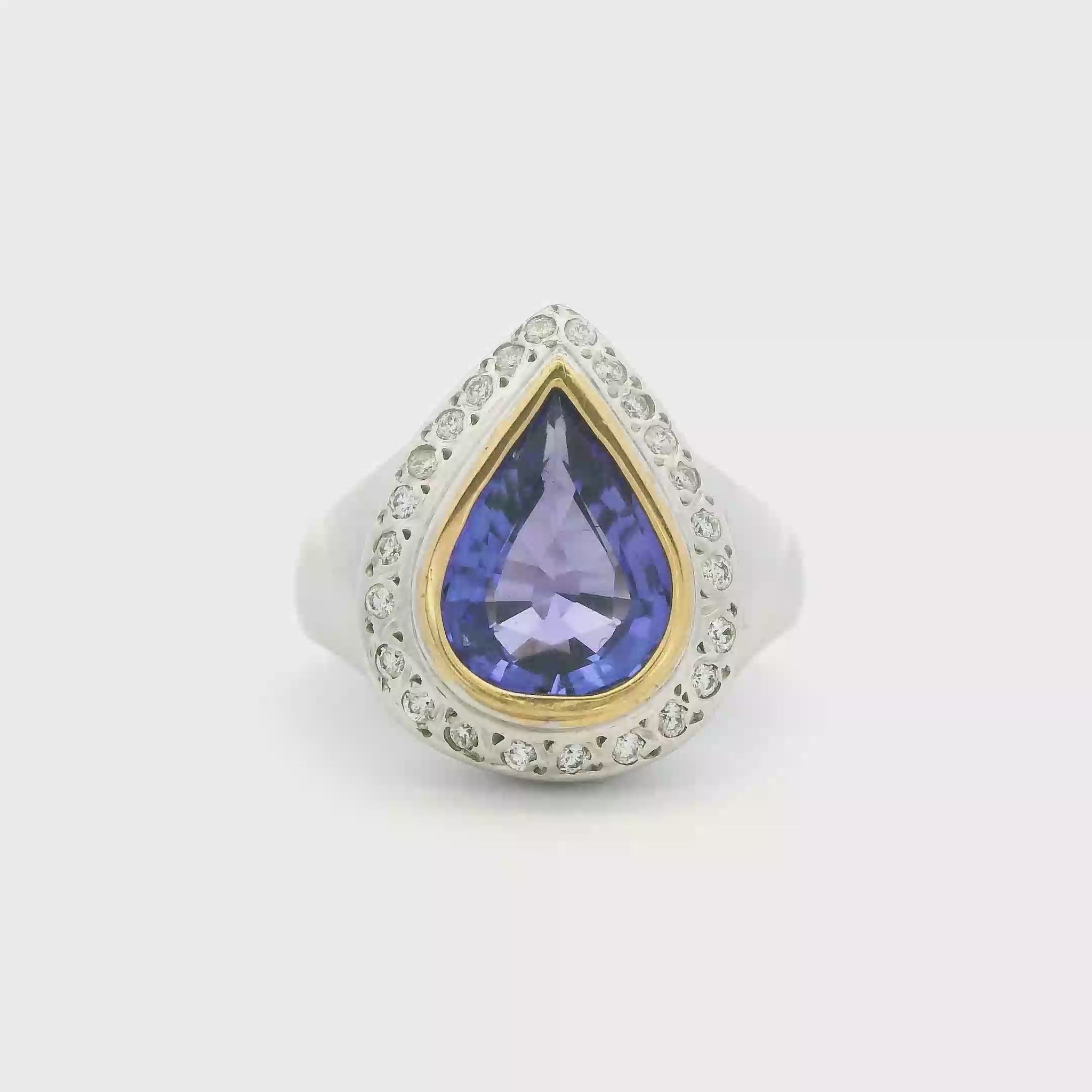 video of 18kt-two-tone-cocktail-ring-with-pear-tanzanite