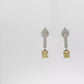 one of a kind matching Fancy Intense Yellow Cushion Cut Diamond Drop Earrings in 18K White Gold