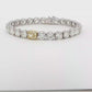 18KWG Tennis Bracelet with 26CT Brilliant-Cut Diamonds and a 1.72 Fancy Yellow Diamond