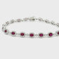 18kt White Gold Tennis Bracelet with Oval Cut Rubies