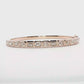 14kt Rose Gold Bangle with 7CT Emerald Cut Diamonds